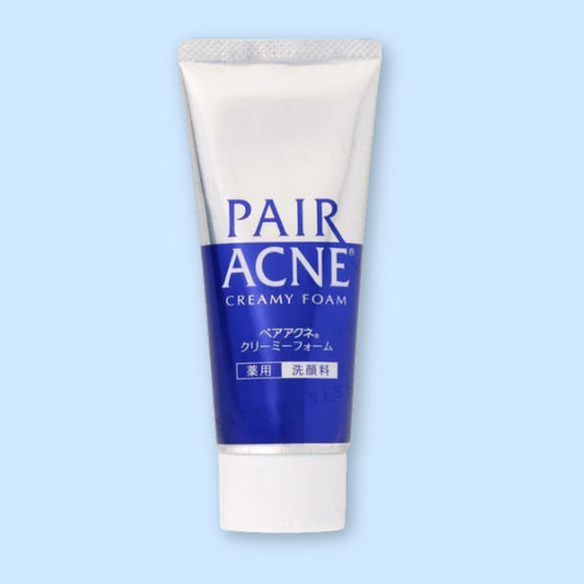 Tube of Pair Acne Creamy Foam on a light blue background