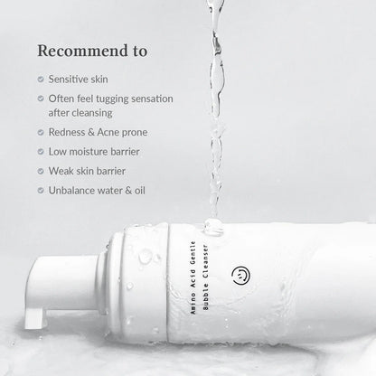 Bottle of Amino Acid Gentle Bubble Cleanser with water droplets on a light gray background