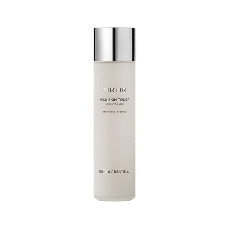A bottle of [TIRTIR] Milk Skin Toner with a white label and silver cap, indicating it is a hydrating and brightening care product.