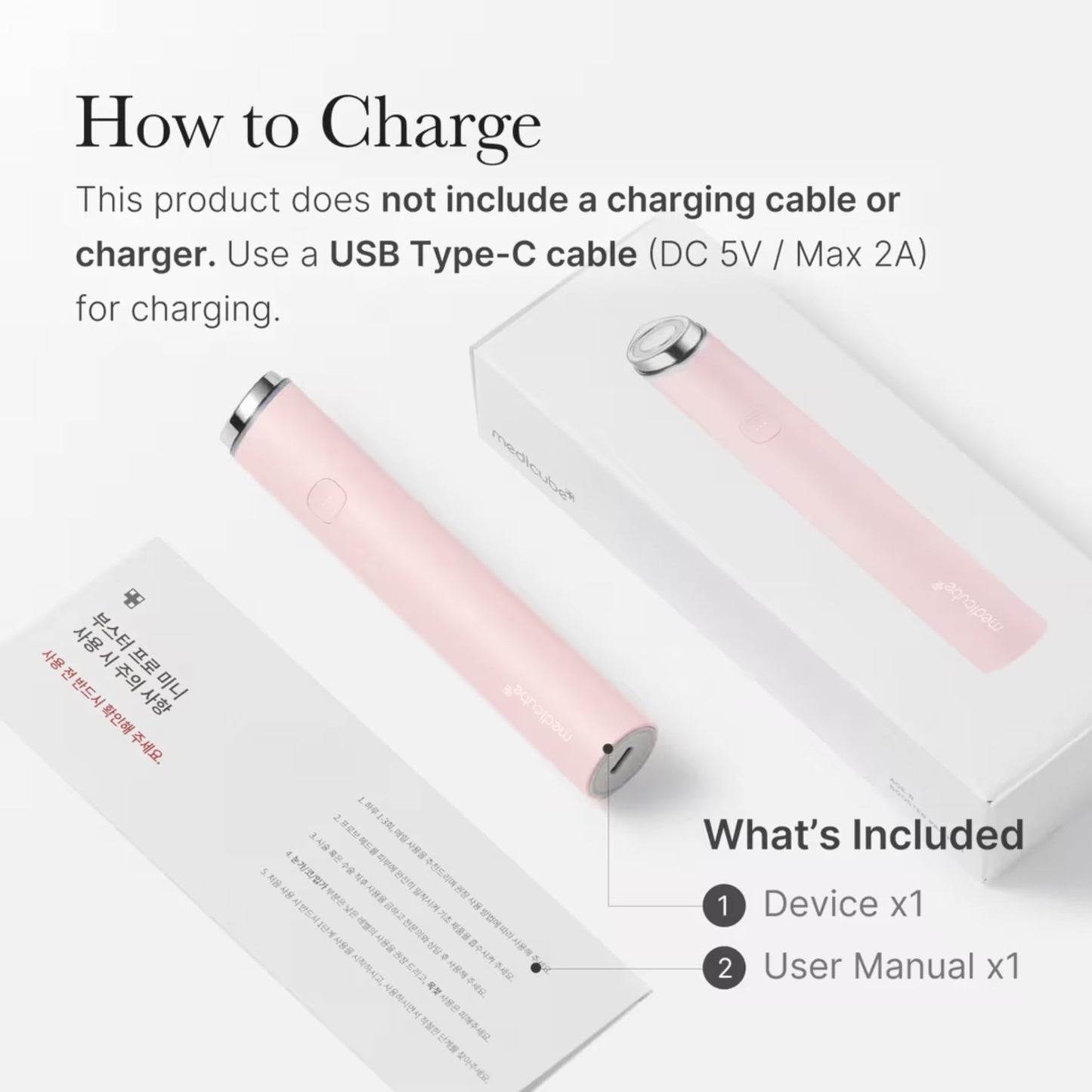 Pink electronic device with USB Type-C cable and user manual on a white background