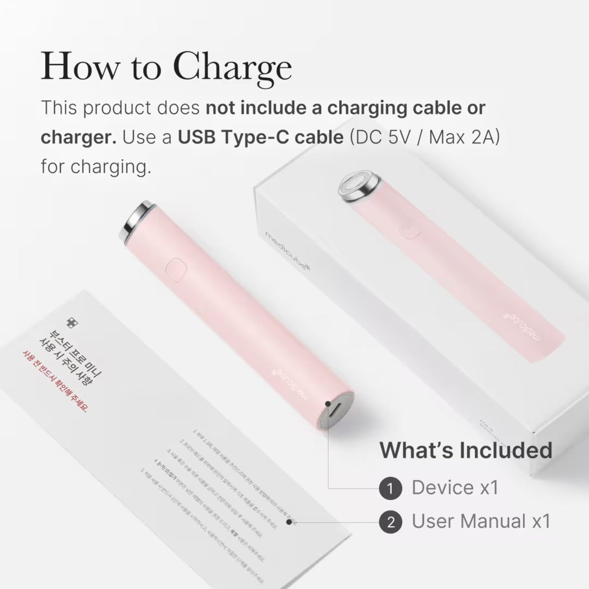 Pink electronic device with USB Type-C cable and user manual on a white background