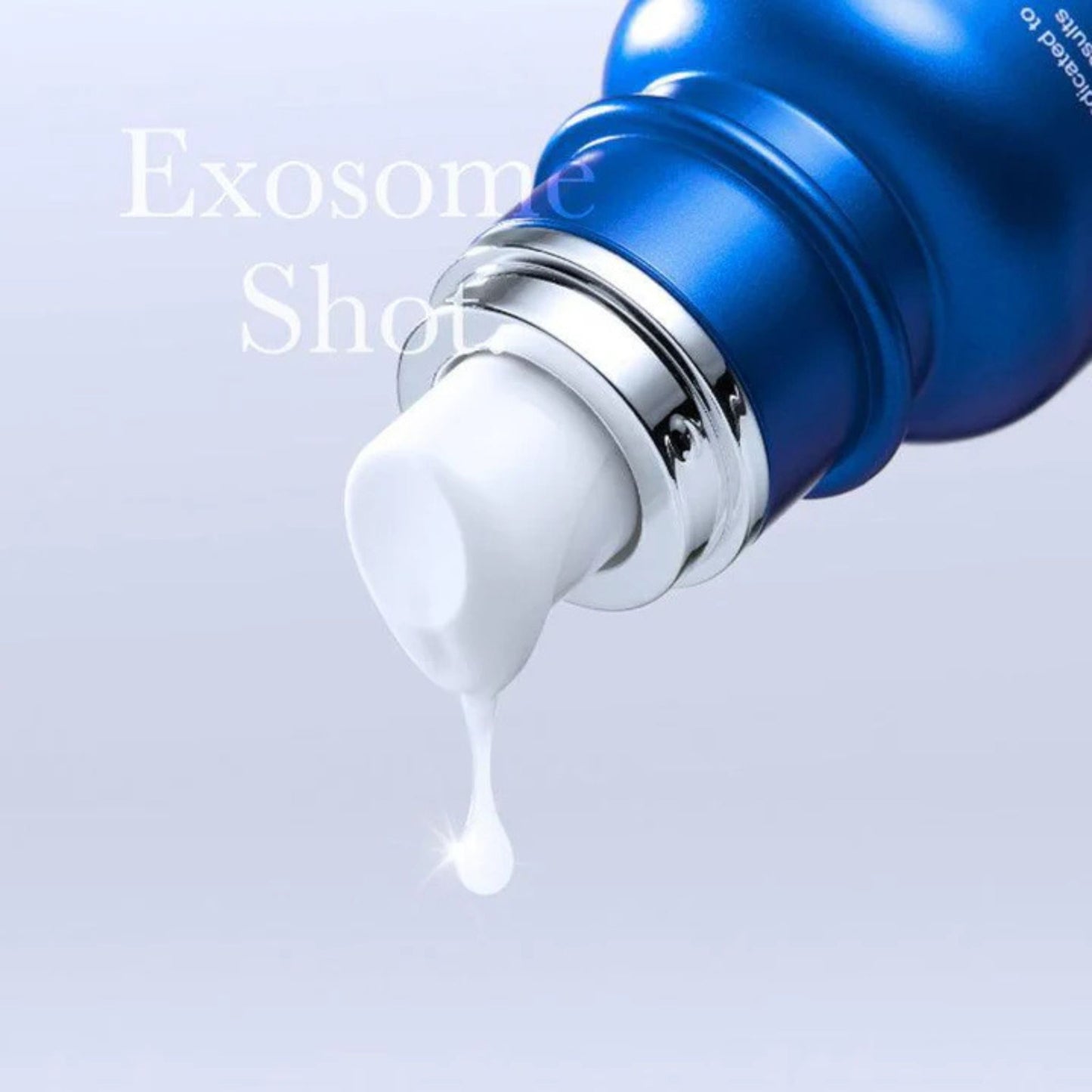 Blue skincare product with white cream being squeezed out on a light gray background, featuring the brand 'Exosome Shot'.