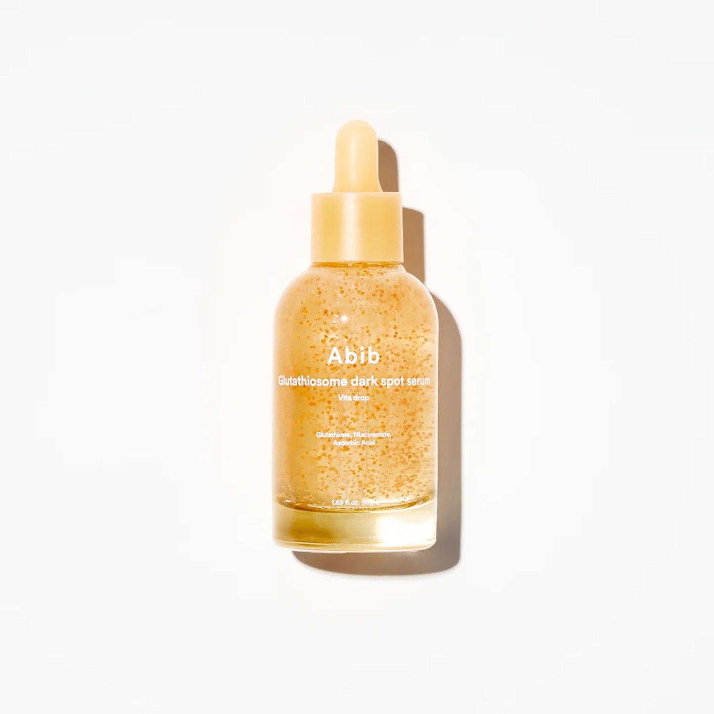 Skincare serum bottle with dropper labeled 'Abib' on a white background
