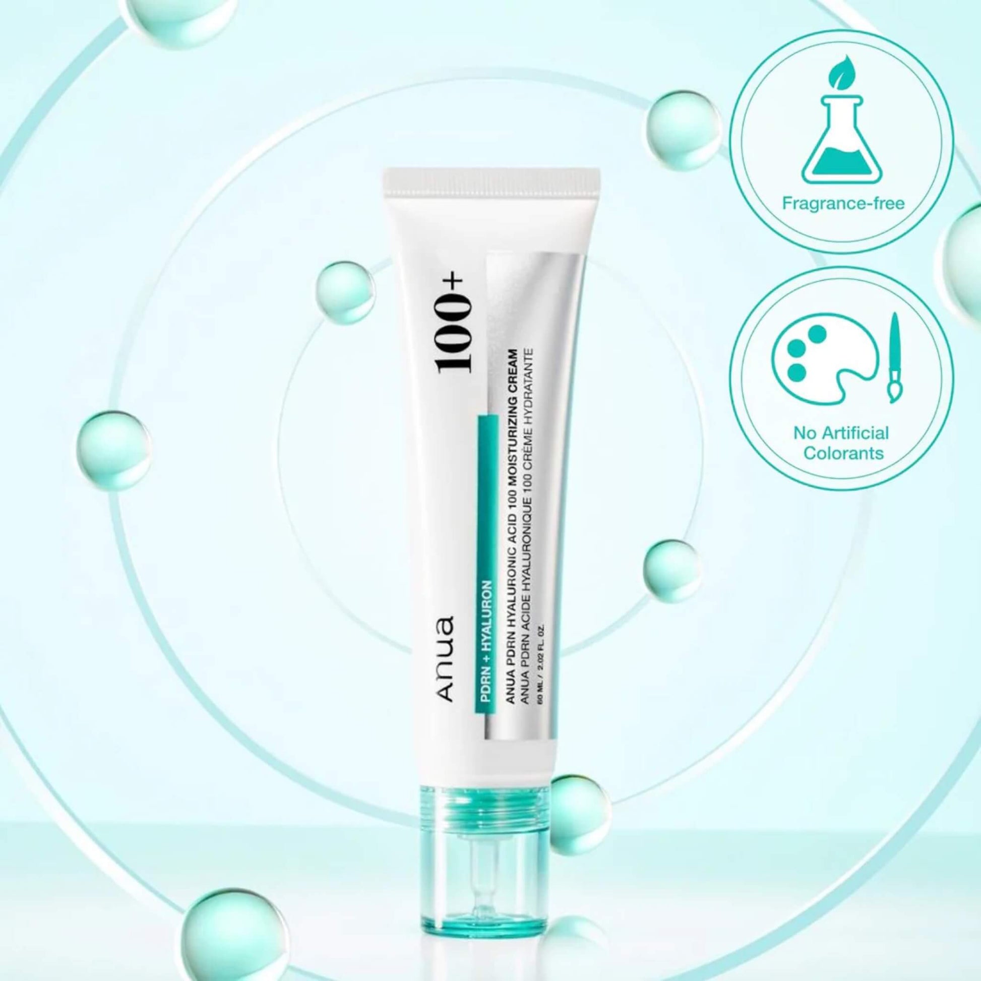Tube of Ahua 100+ moisturizing cream with icons indicating fragrance-free and no artificial colorants on a light blue background.