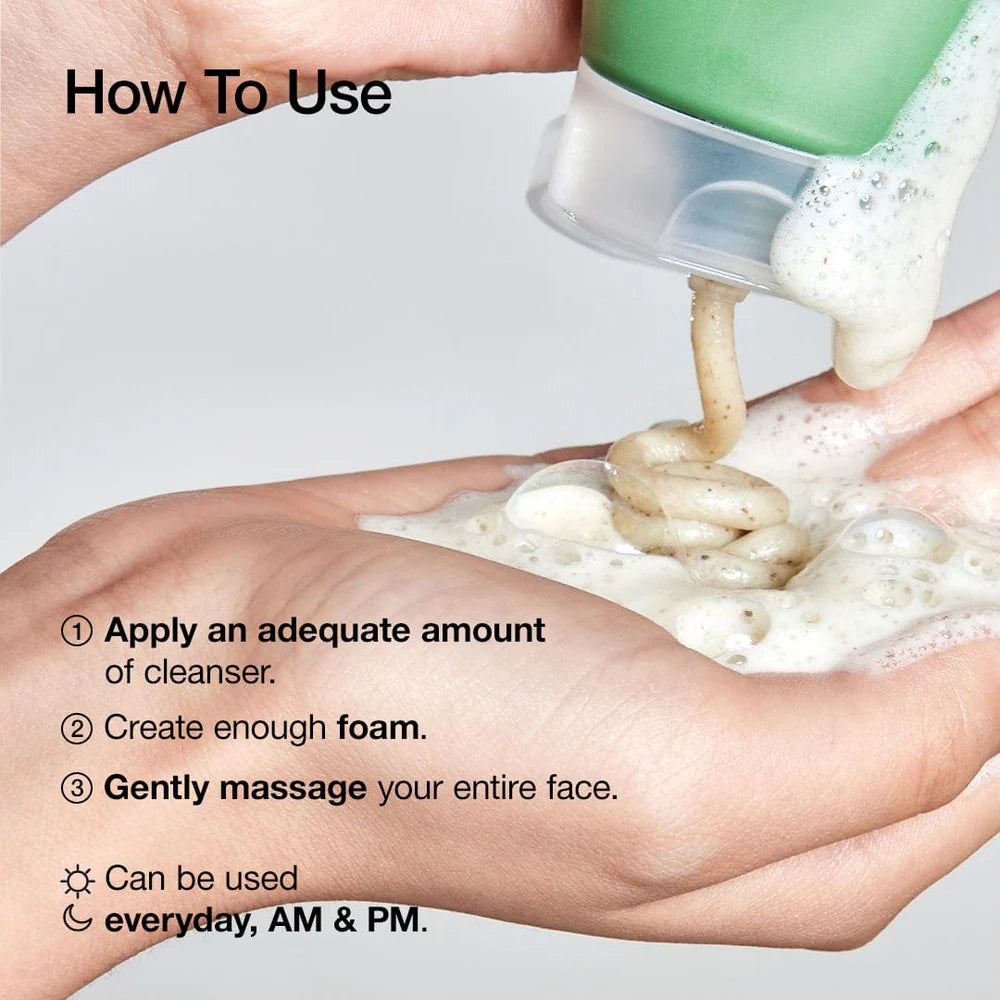 Hand demonstrating how to use a cleanser with text instructions on a gray background