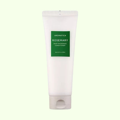 Aromatica Rosemary hair thickening conditioner tube on a light green background