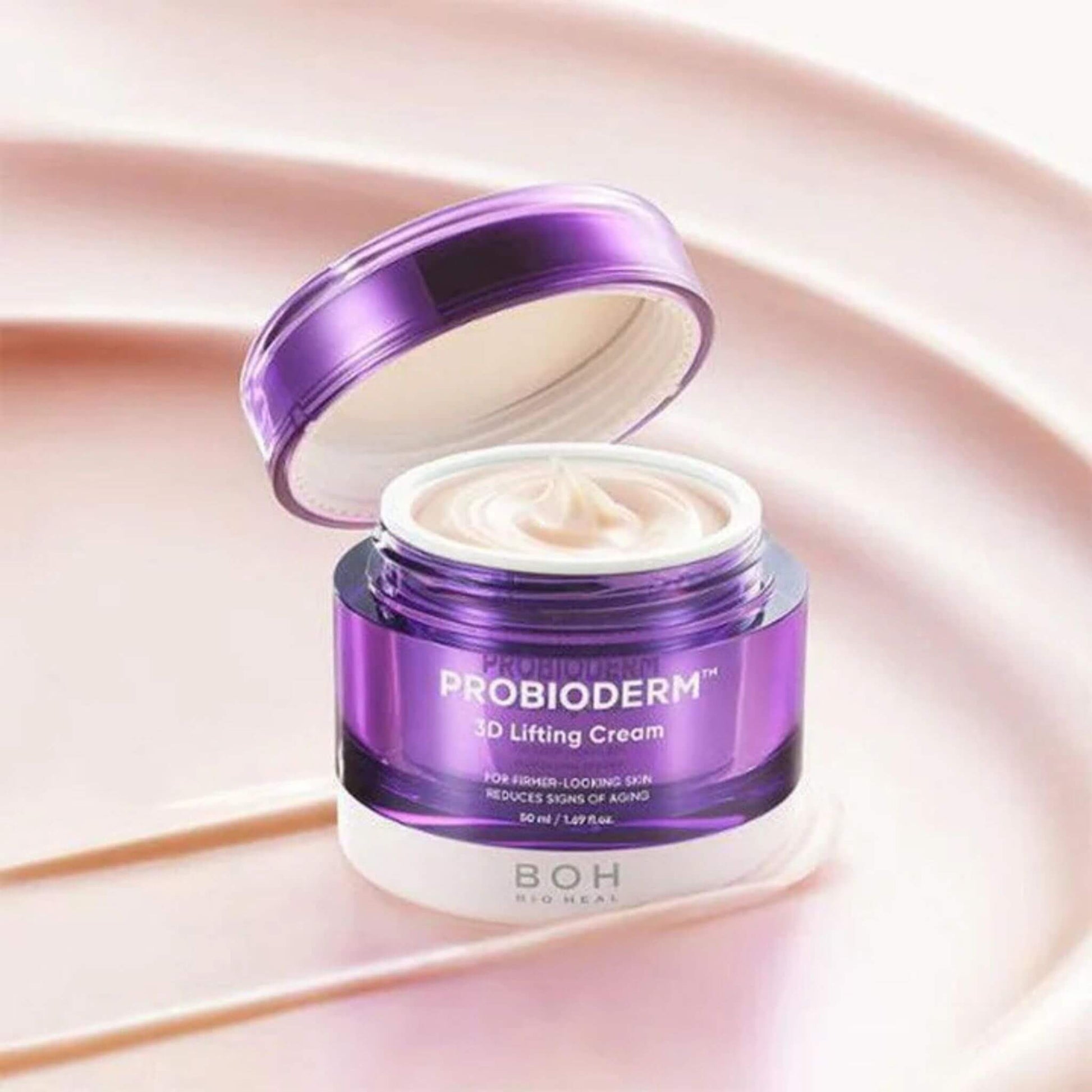 Purple jar of Probioderm 3D Lifting Cream on a pink background