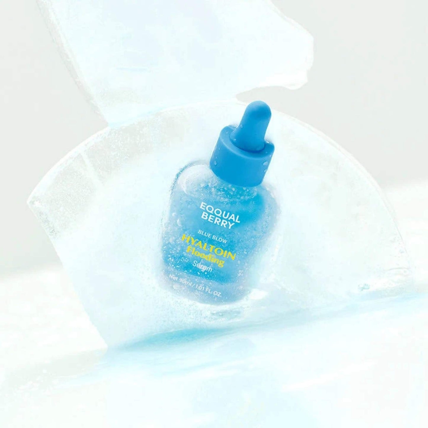 Blue bottle with a dropper labeled 'Equal Berry' on a white background