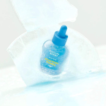 Blue bottle with a dropper labeled 'Equal Berry' on a white background