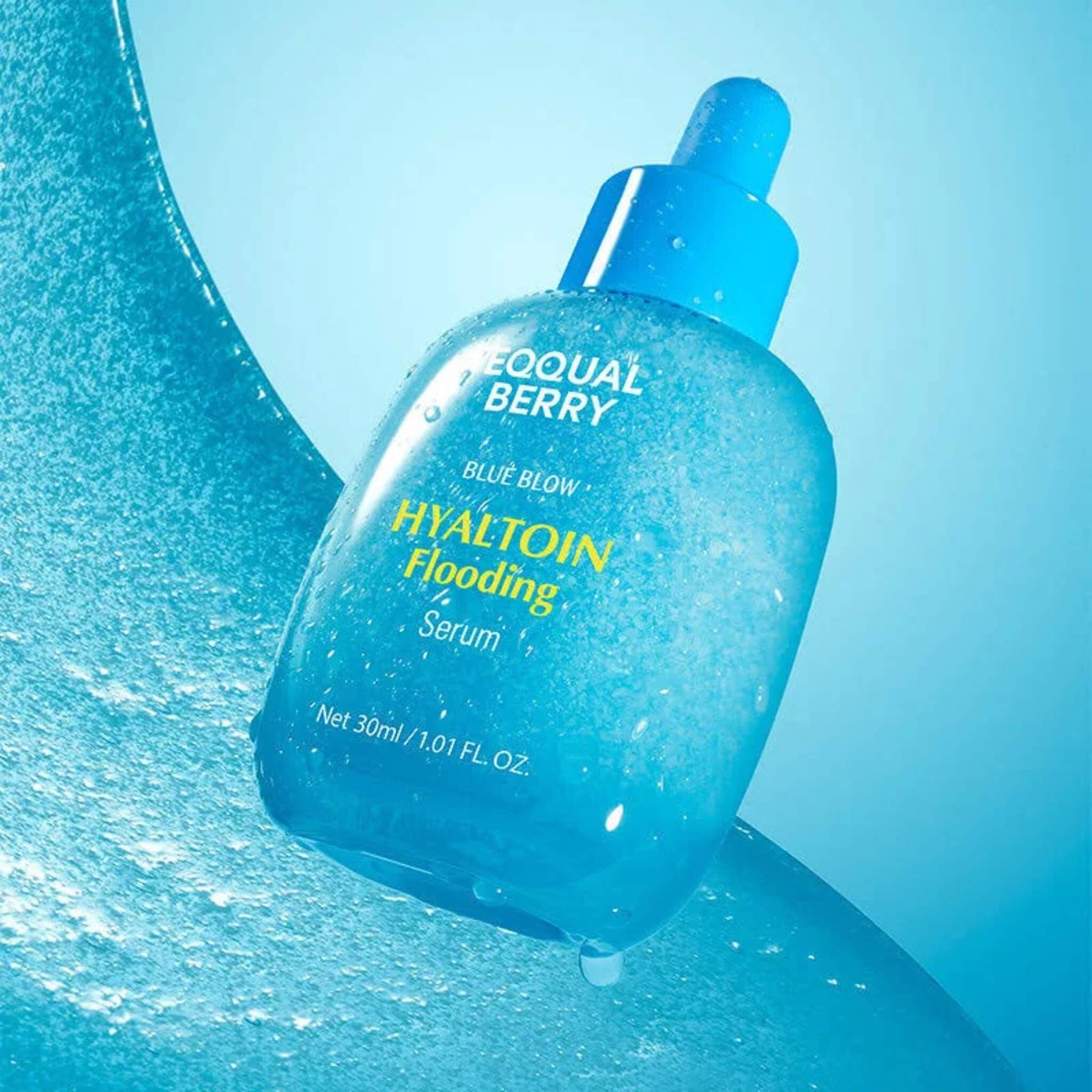 Blue bottle of Equal Berry Blue Glow Hyaltoin Flooding Serum on a blue background