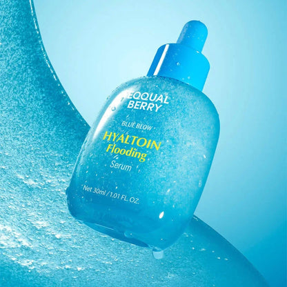 Blue bottle of Equal Berry Blue Glow Hyaltoin Flooding Serum on a blue background