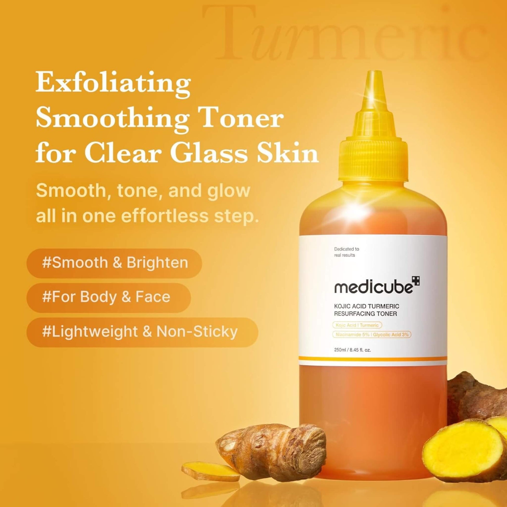 Bottle of medicube toner with turmeric root and pieces on a yellow background