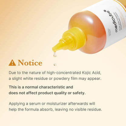 Bottle of serum with a dropper on a beige background, featuring text about Kojic Acid.