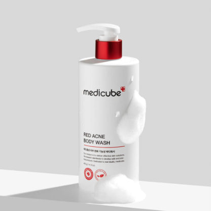 Medicube Red Acne Body Wash bottle on a light gray background