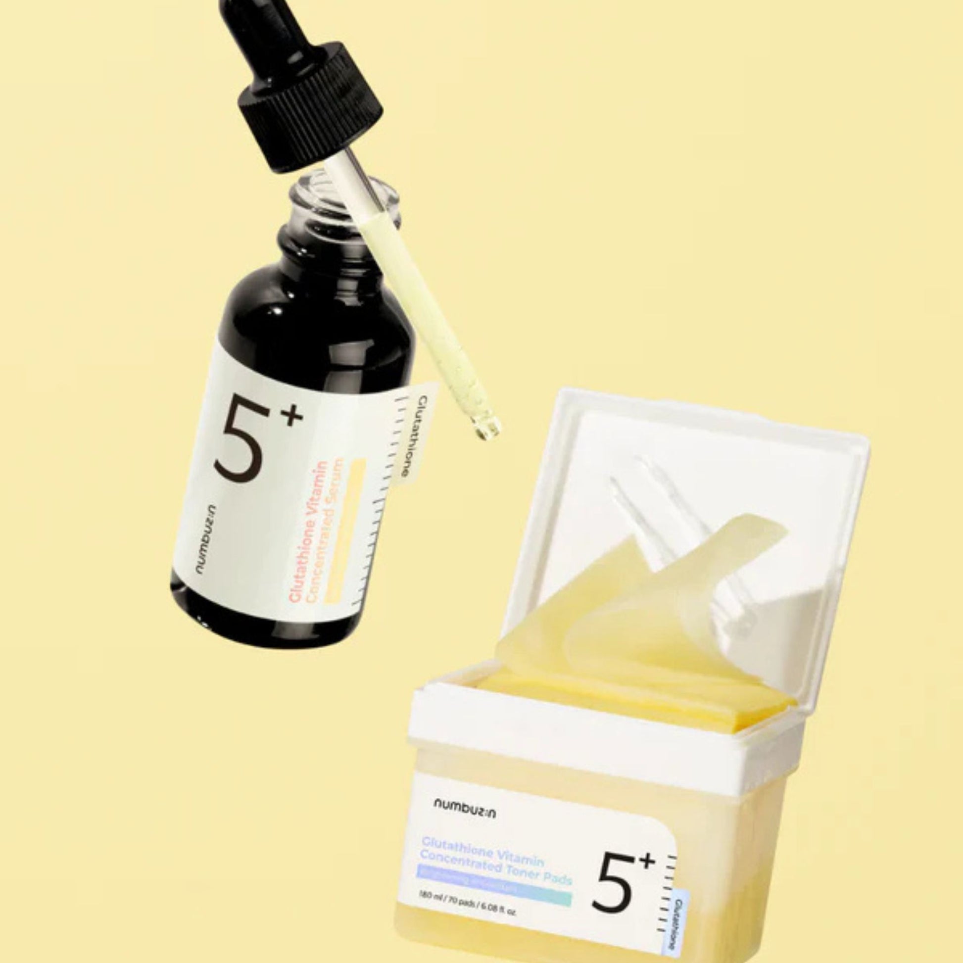 Korean skincare set with Vitamin C serum and Niacinamide pads