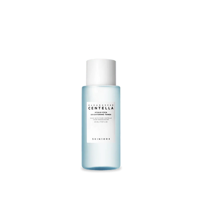 Skincare bottle with a white cap on a white background