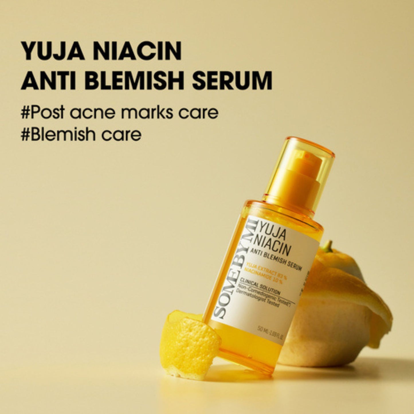Yuja Niacin anti blemish serum with lemons on a beige background