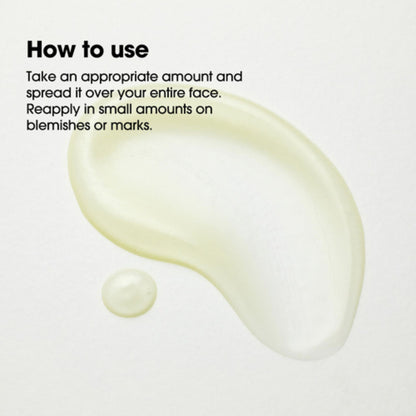 Instructions on how to use a skincare product with droplets on a light background