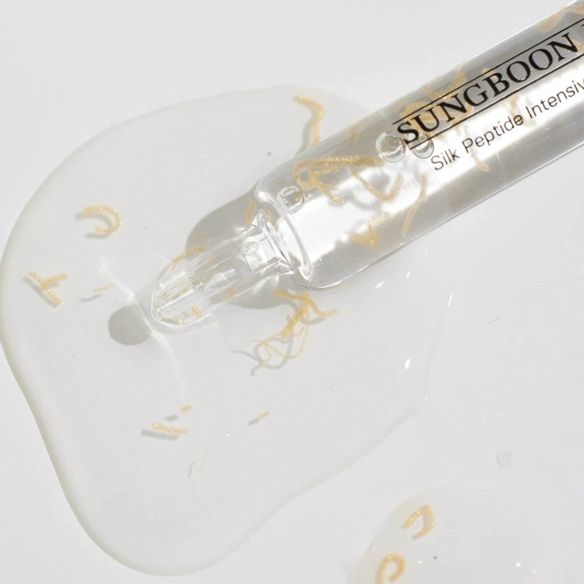 Sungboon Silk Peptide Intensive serum with applicator on a white background